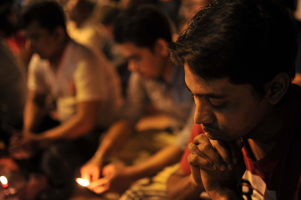 KUALA LUMPUR , 7/4/2014. Participants solidarity for Malaysia Airlines flight MH370 prays at Merdeka Square Kuala Lumpur after 31 days missing at Hindi Ocean . AWANI / SHAHIR OMAR