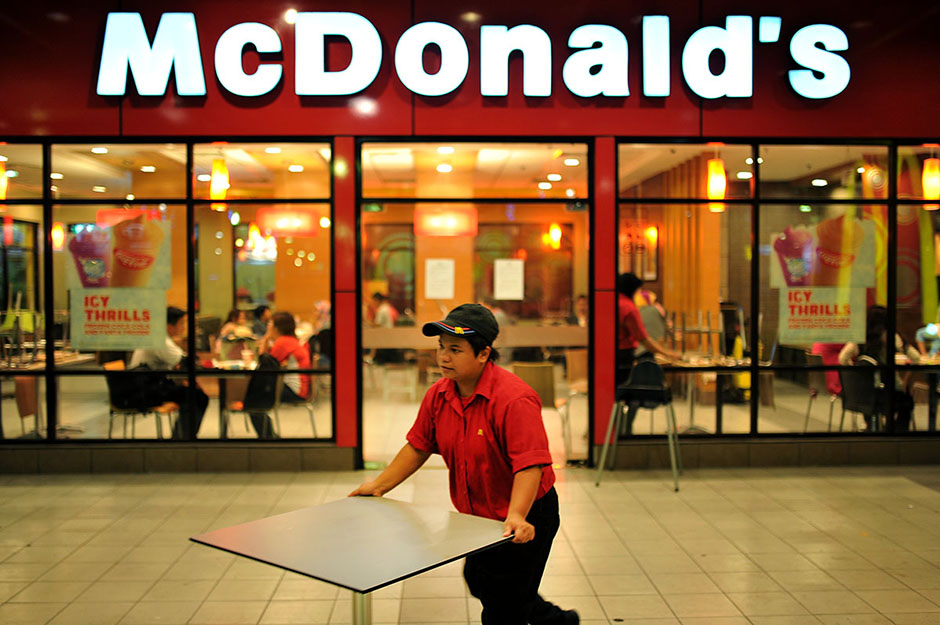 KUALA LUMPUR , 8/5/2014. Mc Donald's staff lift a table at Low Cost Carrier Terminal (LCCT) Sepang. On this night LCCT will be last operation and Air Asia will beginning their operation in KLIA2 start on Friday. AWANI / SHAHIR OMAR